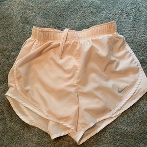 Nike cream running shorts